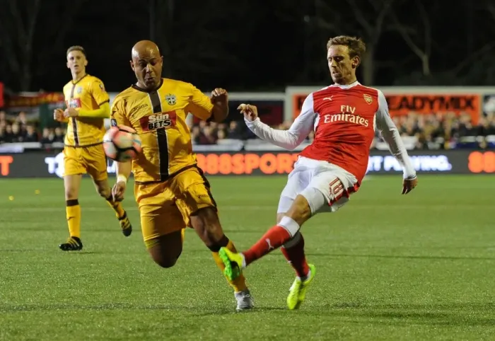 Framed Print : Arsenal's Nacho Monreal Faces Off Against Sutton United's Simon Downer in FA Cup Fifth Round Clash