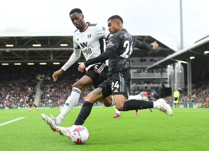 Framed Print : Arsenal's Nelson Clashes with Fulham's Adarabioyo: A Premier League Battle at Craven Cottage Framed Print : Arsenal's Nelson Clashes with Fulham's Adarabioyo: A Premier League Battle at Craven Cottage