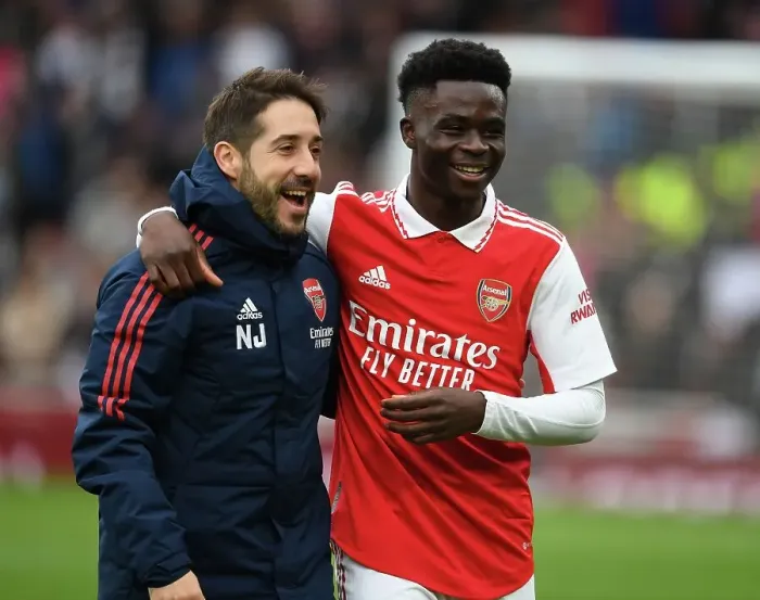 Framed Print : Arsenal's Nico Jover Congratulates Bukayo Saka after Arsenal v Leeds United, Premier League 2022-23