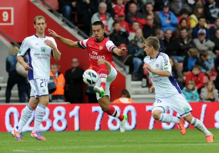 Framed Print : Arsenal's Nico Yennaris Faces Off Against Dennis Praet and Tom De Sutter of Anderlecht in Pre-Season Clash Framed Print : Arsenal's Nico Yennaris Faces Off Against Dennis Praet and Tom De Sutter of Anderlecht in Pre-Season Clash