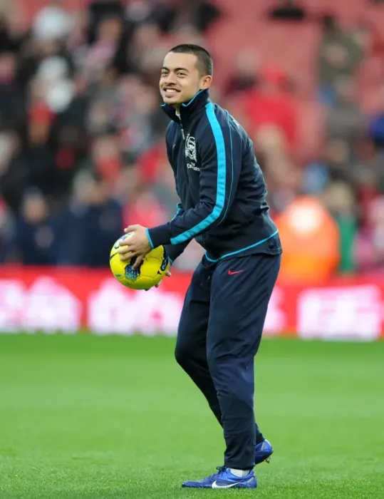 Framed Print : Arsenal's Nico Yennaris Fights Hard in Tight Arsenal vs Manchester United Battle (2012)