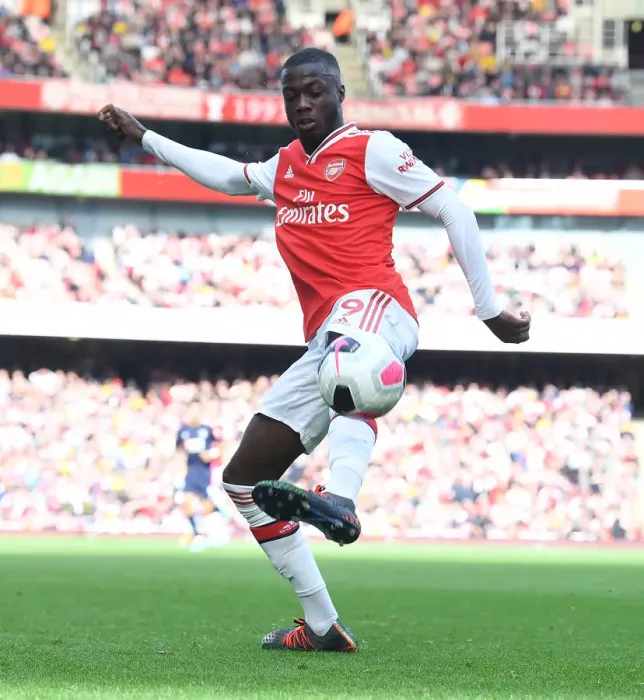 Framed Print : Arsenal's Nicolas Pepe in Action against AFC Bournemouth, Premier League 2019-20