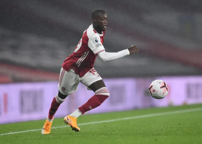 Framed Print : Arsenal's Nicolas Pepe in Action against Aston Villa in the Premier League (2020-21)