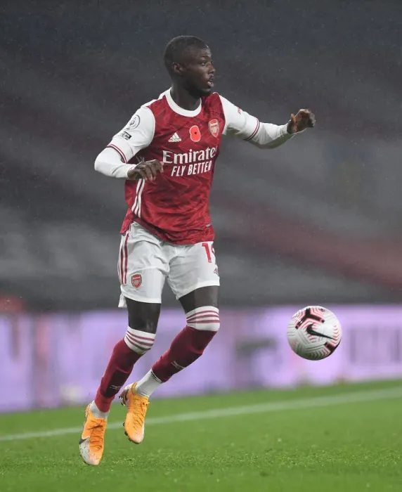 Framed Print : Arsenal's Nicolas Pepe in Action against Aston Villa - Premier League 2020-21