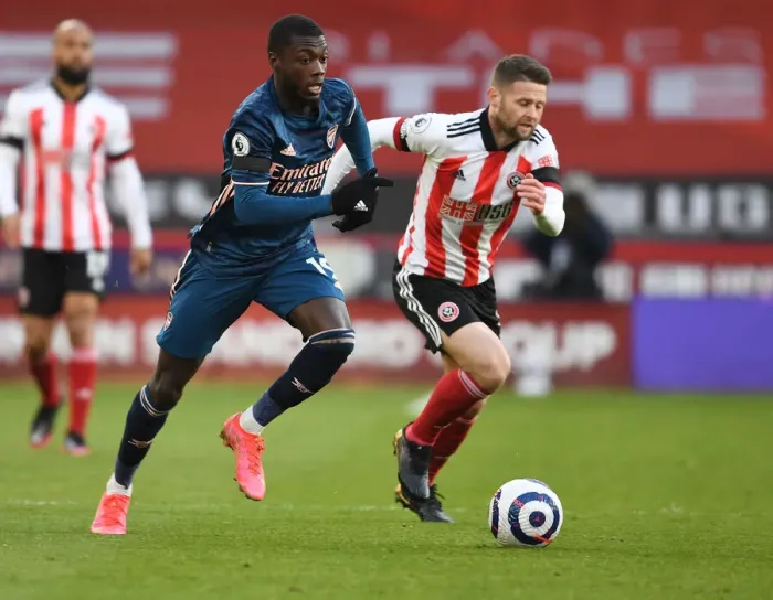 Framed Print : Arsenal's Nicolas Pepe in Action at Empty Bramall Lane: Sheffield United vs Arsenal, Premier League 2021
