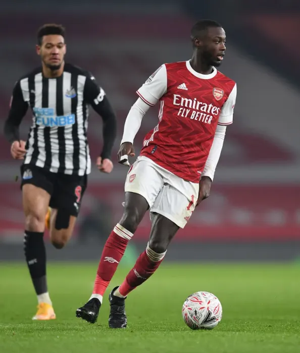 Framed Print : Arsenal's Nicolas Pepe in Action: FA Cup Third Round Clash Against Newcastle United Framed Print : Arsenal's Nicolas Pepe in Action: FA Cup Third Round Clash Against Newcastle United
