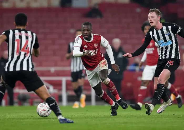 Framed Print : Arsenal's Nicolas Pepe in Action during FA Cup Third Round Match against Newcastle United Framed Print : Arsenal's Nicolas Pepe in Action during FA Cup Third Round Match against Newcastle United