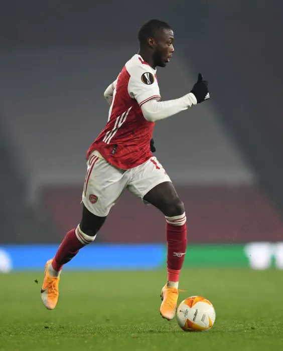 Framed Print : Arsenal's Nicolas Pepe in Action against Molde FK in Europa League Group Stage