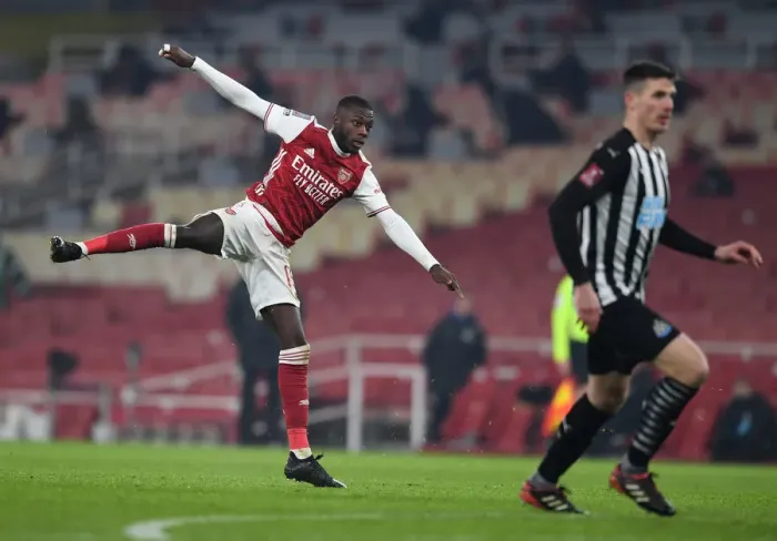 Framed Print : Arsenal's Nicolas Pepe in Action against Newcastle United in FA Cup Third Round