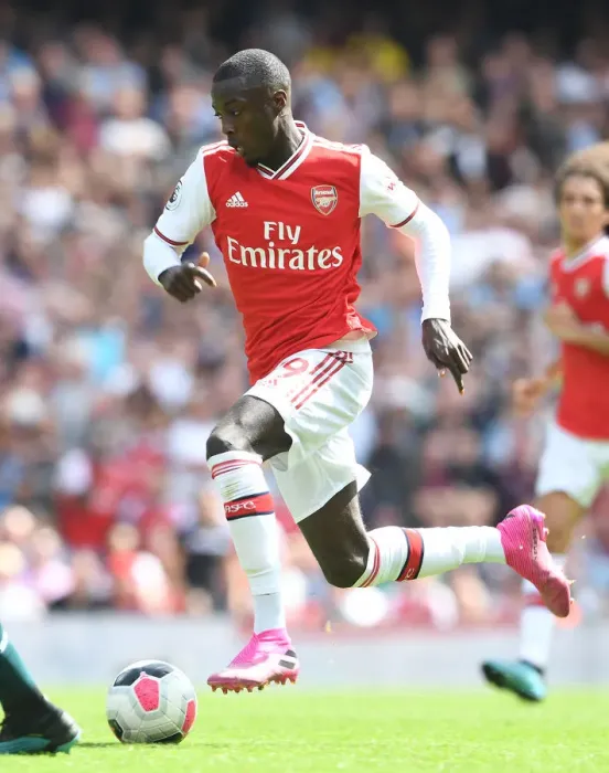 Framed Print : Arsenal's Nicolas Pepe in Action: Premier League Showdown against Burnley, 2019-20