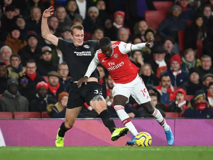 Framed Print : Arsenal's Nicolas Pepe Battles Dan Burn in Intense Arsenal v Brighton Clash, Premier League 2019-20 Framed Print : Arsenal's Nicolas Pepe Battles Dan Burn in Intense Arsenal v Brighton Clash, Premier League 2019-20