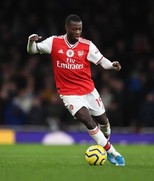 Framed Print : Arsenal's Nicolas Pepe Faces Manchester City in the Premier League
