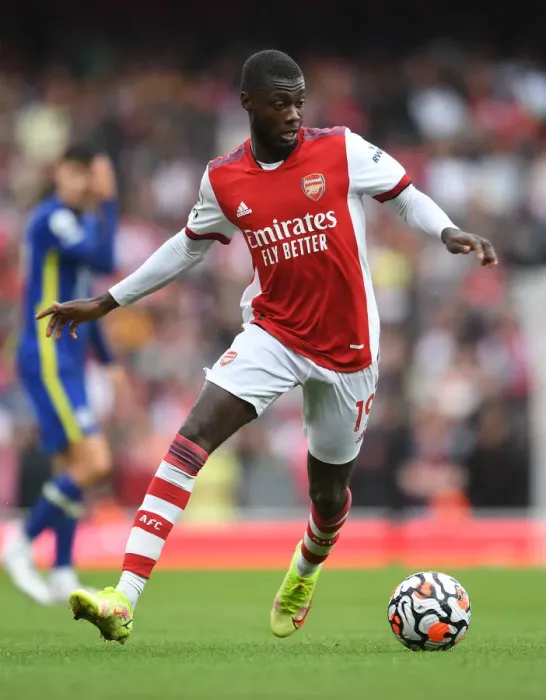 Framed Print : Arsenal's Nicolas Pepe Faces Off Against Chelsea in the 2021-22 Premier League