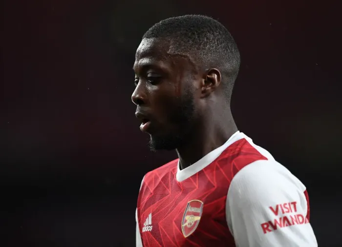 Framed Print : Arsenal's Nicolas Pepe Faces Off Against Tottenham in Premier League Clash Framed Print : Arsenal's Nicolas Pepe Faces Off Against Tottenham in Premier League Clash