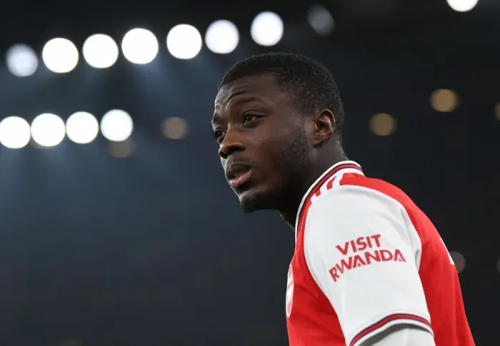 Framed Print : Arsenal's Nicolas Pepe Gears Up for Arsenal v Manchester United Clash (2019-2020)
