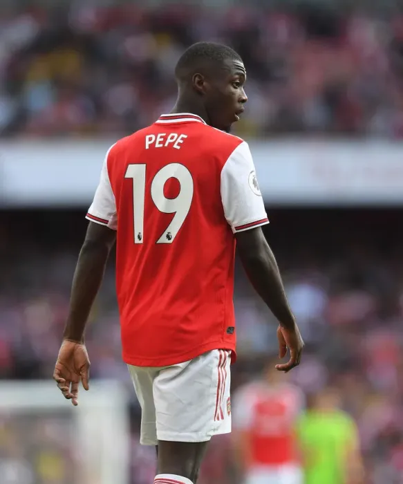 Framed Print : Arsenal's Nicolas Pepe Goes Head-to-Head with Tottenham in Intense 2019-20 Premier League Showdown