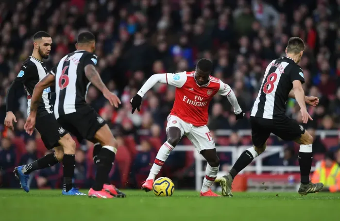 Framed Print : Arsenal's Nicolas Pepe Shines in Arsenal FC vs Newcastle United (2019-20) Framed Print : Arsenal's Nicolas Pepe Shines in Arsenal FC vs Newcastle United (2019-20)
