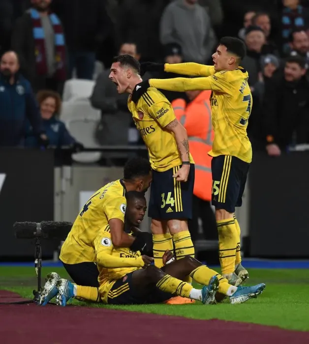 Framed Print : Arsenal's Nicolas Pepe and Teammates Celebrate Goal Against West Ham United, Premier League 2019-20 Framed Print : Arsenal's Nicolas Pepe and Teammates Celebrate Goal Against West Ham United, Premier League 2019-20