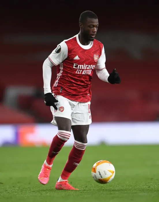 Framed Print : Arsenal's Nicolas Pepe in UEFA Europa League Quarterfinal: Arsenal FC vs Slavia Praha (Behind Closed Doors)
