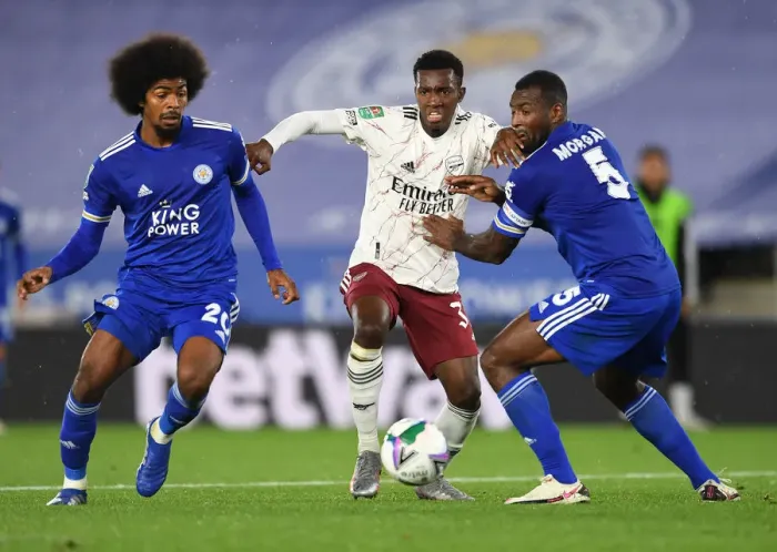 Framed Print : Arsenal's Nketiah Clashes with Leicester's Choudhury and Morgan in Carabao Cup Showdown