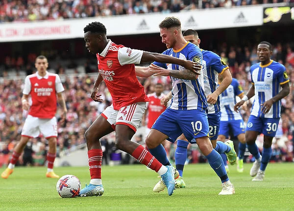 Arsenal's Nketiah Faces Off Against Brighton's Mac Allister in Intense Premier League Clash
