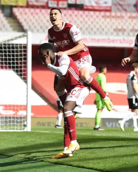 Framed Print : Arsenal's Nketiah and Martinelli Celebrate Goal Amid Empty Emirates Stadium Against Fulham, April 2021 Framed Print : Arsenal's Nketiah and Martinelli Celebrate Goal Amid Empty Emirates Stadium Against Fulham, April 2021
