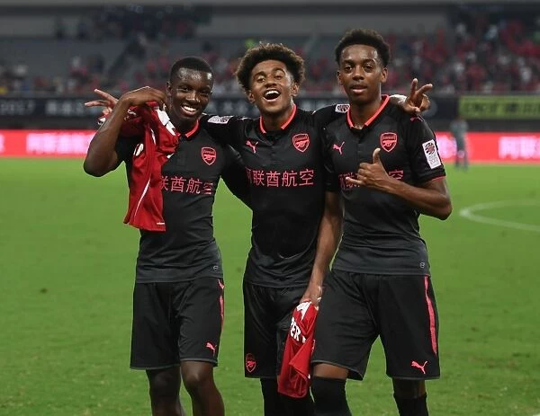 Arsenal's Nketiah, Nelson, and Willock: Celebrating Victory in Shanghai (2017)