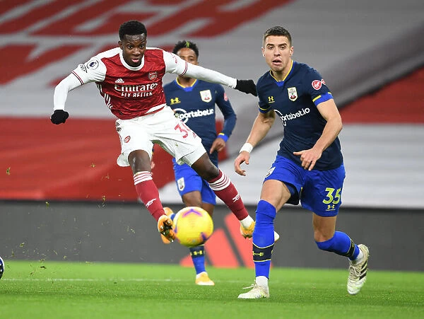 Arsenal's Nketiah Outwits Southampton's Bednarek in Exciting Emirates Clash (2020-21)