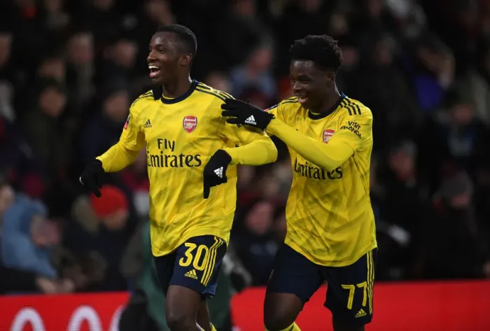 Framed Print : Arsenal's Nketiah and Saka Celebrate FA Cup Goals Against AFC Bournemouth