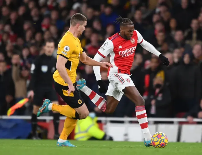 Framed Print : Arsenal's Nuno Tavares Clashes with Leander Dendoncker of Wolverhampton Wanderers: A Premier League Showdown