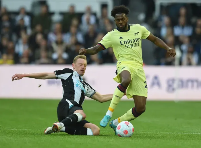 Framed Print : Arsenal's Nuno Tavares Faces Off Against Newcastle's Sean Longstaff in Intense Premier League Clash Framed Print : Arsenal's Nuno Tavares Faces Off Against Newcastle's Sean Longstaff in Intense Premier League Clash