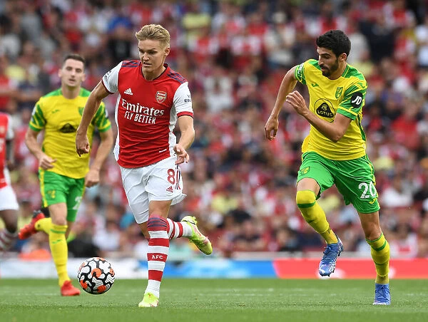 Arsenal's Odegaard Clashes with Norwich's Lees-Melou: A Premier League Showdown at Emirates Stadium