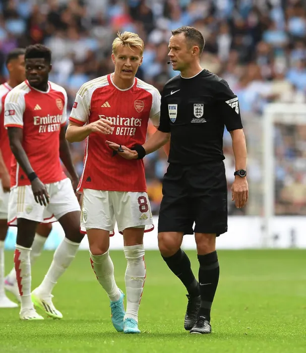 Framed Print : Arsenal's Odegaard Discusses Calls with Referee during FA Community Shield Clash vs Manchester City (2023-24) Framed Print : Arsenal's Odegaard Discusses Calls with Referee during FA Community Shield Clash vs Manchester City (2023-24)