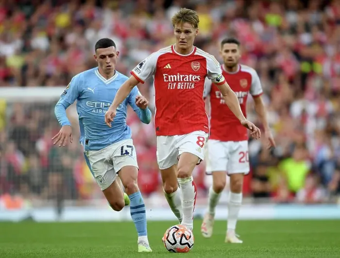 Framed Print : Arsenal's Odegaard Faces Off Against Manchester City's Foden in Premier League Showdown (2023-24) Framed Print : Arsenal's Odegaard Faces Off Against Manchester City's Foden in Premier League Showdown (2023-24)