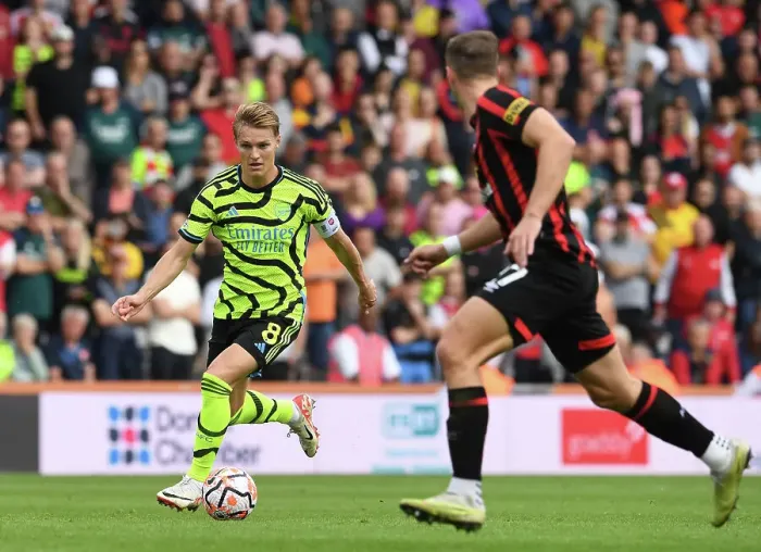 Framed Print : Arsenal's Odegaard Faces Pressure from Bournemouth's Zabarnyi in Premier League Clash (AFC Bournemouth vs Arsenal, 2023-24) Framed Print : Arsenal's Odegaard Faces Pressure from Bournemouth's Zabarnyi in Premier League Clash (AFC Bournemouth vs Arsenal, 2023-24)
