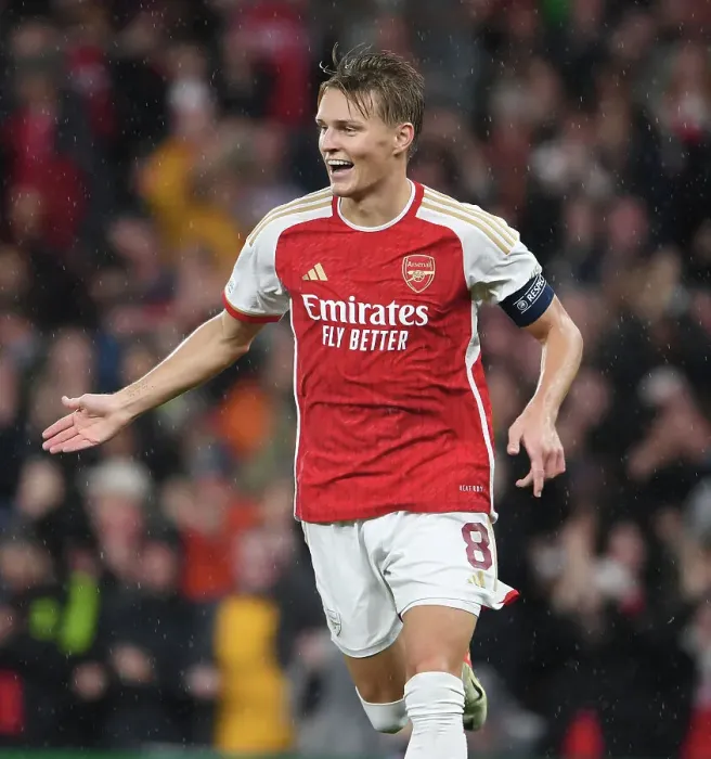 Framed Print : Arsenal's Odegaard Scores Fourth Goal in Champions League Victory over PSV Eindhoven