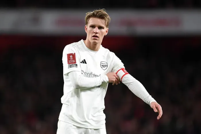 Framed Print : Arsenal's Odegaard Stares Intensely in All-White: A Moment of Focus Amidst No More Red Campaign during Arsenal vs. Liverpool FA Cup Clash Framed Print : Arsenal's Odegaard Stares Intensely in All-White: A Moment of Focus Amidst No More Red Campaign during Arsenal vs. Liverpool FA Cup Clash