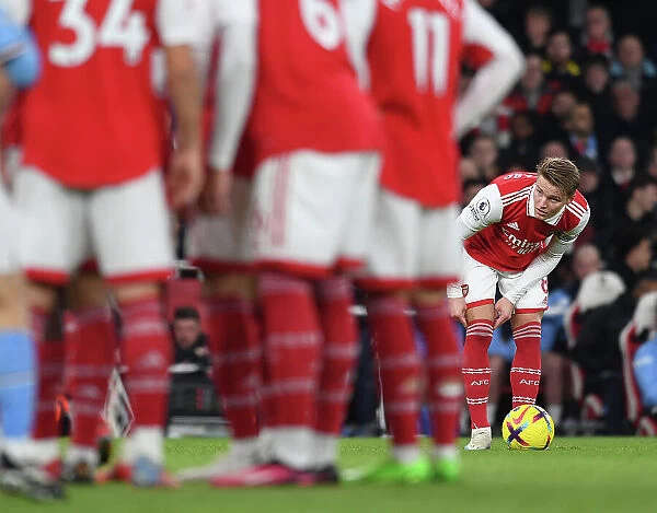 Arsenal's Odegaard Takes on Manchester City: Midfield Battle at Emirates Stadium