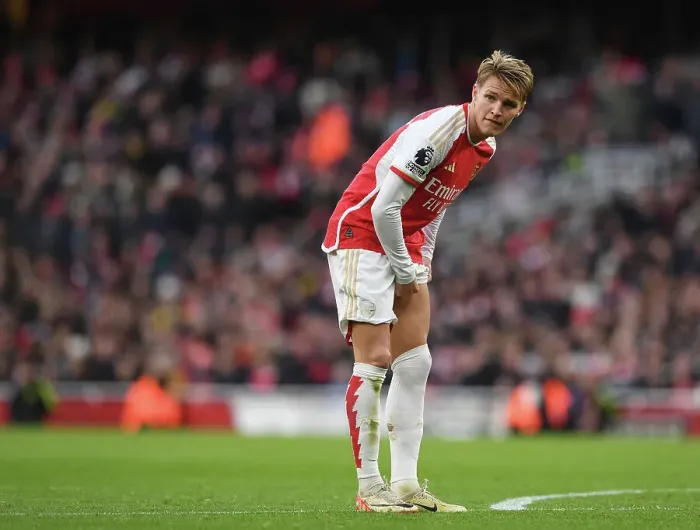 Framed Print : Arsenal's Odegaard: Unwavering Concentration Amidst Premier League Battle (2023-24): Arsenal vs Brighton & Hove Albion Framed Print : Arsenal's Odegaard: Unwavering Concentration Amidst Premier League Battle (2023-24): Arsenal vs Brighton & Hove Albion