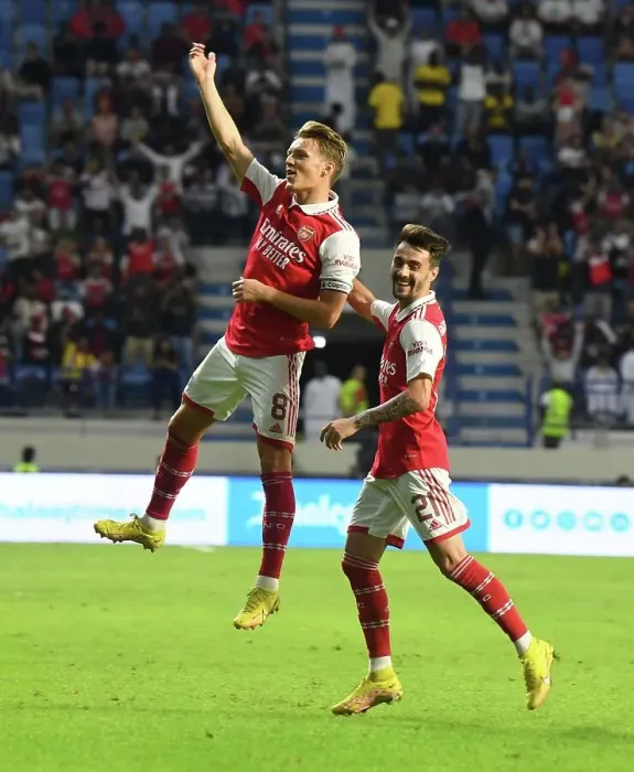 Framed Print : Arsenal's Odegaard and Vieira Celebrate Goals Against AC Milan in Dubai Super Cup Framed Print : Arsenal's Odegaard and Vieira Celebrate Goals Against AC Milan in Dubai Super Cup
