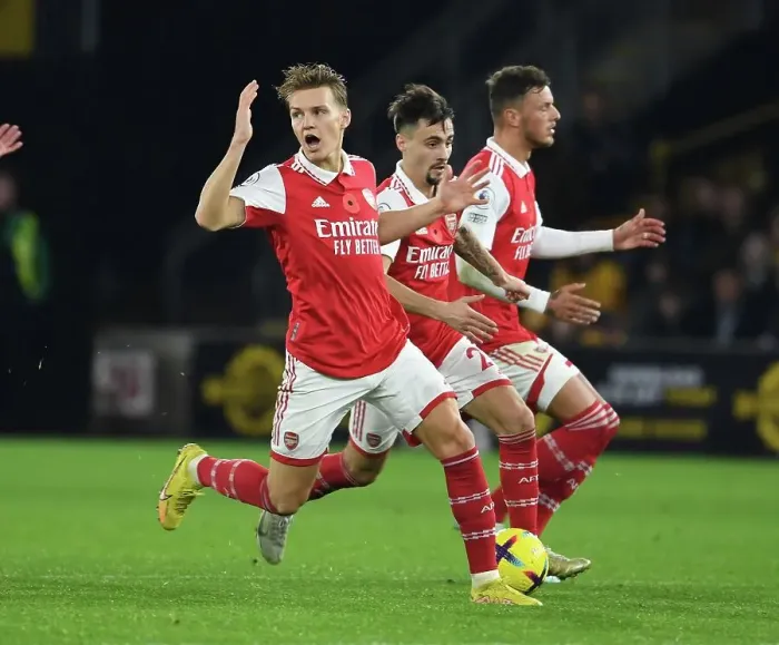 Framed Print : Arsenal's Odegaard, Vieira, and White in Action: Premier League 2022-23 - Wolverhampton Wanderers vs. Arsenal