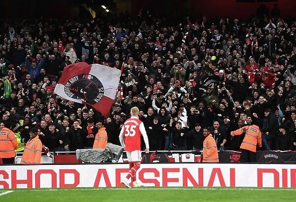 Arsenal's Oleksandr Zinchenko Celebrates with Fans after Victory over AFC Bournemouth (2022-23)