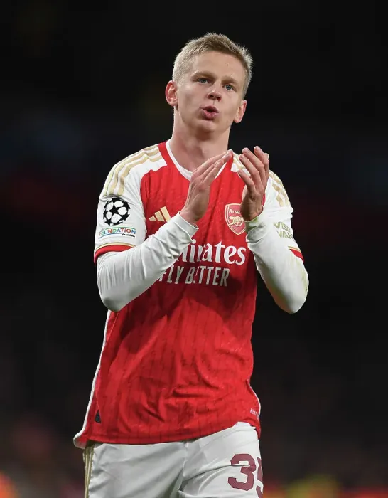 Framed Print : Arsenal's Oleksandr Zinchenko Celebrates with Fans after Victory over Sevilla in 2023-24 UEFA Champions League