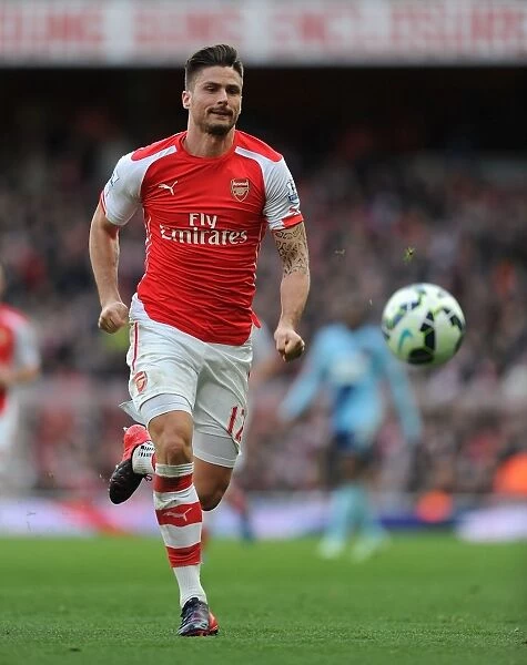 Arsenal's Olivier Giroud in Action during the Arsenal vs. West Ham United Premier League 2014 / 15 Match