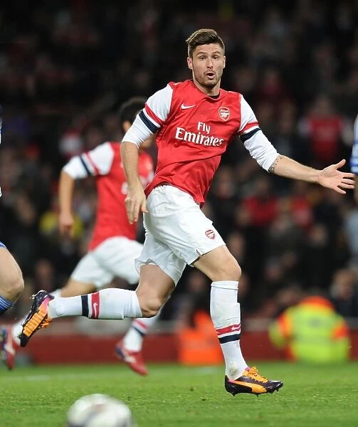 Arsenal's Olivier Giroud in Action against Chelsea in the Capital One Cup