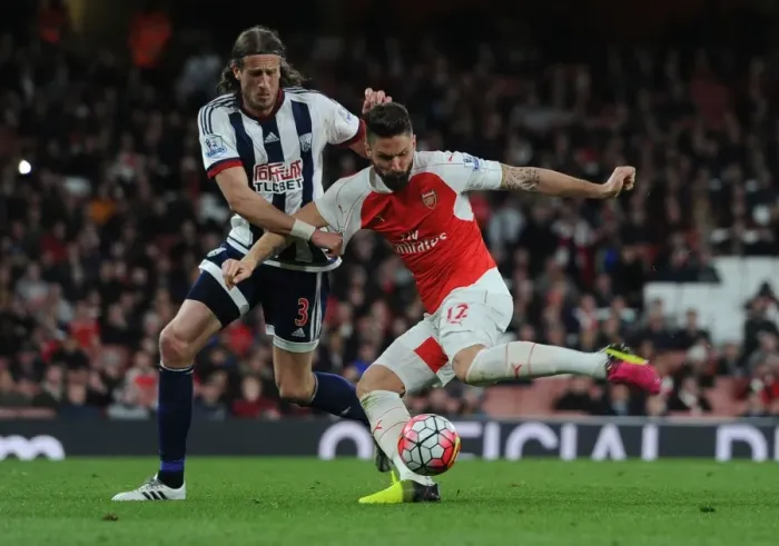 Framed Print : Arsenal's Olivier Giroud Battles Jonas Olsson in Intense Premier League Showdown