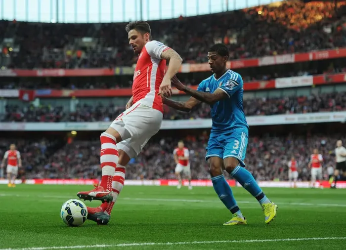 Framed Print : Arsenal's Olivier Giroud Battles Past Sunderland's Patrick van Aanholt in Intense Premier League Showdown Framed Print : Arsenal's Olivier Giroud Battles Past Sunderland's Patrick van Aanholt in Intense Premier League Showdown