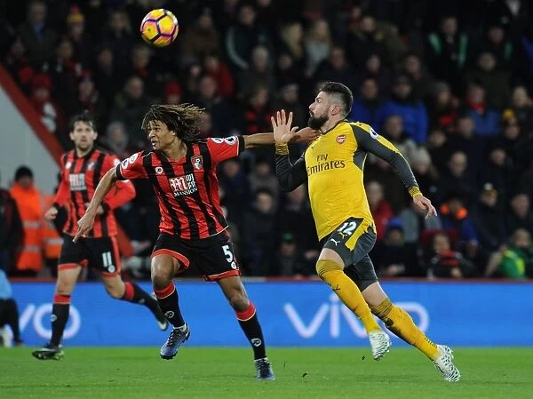 Arsenal's Olivier Giroud Clashes with Bournemouth's Nathan Ake in Premier League Showdown