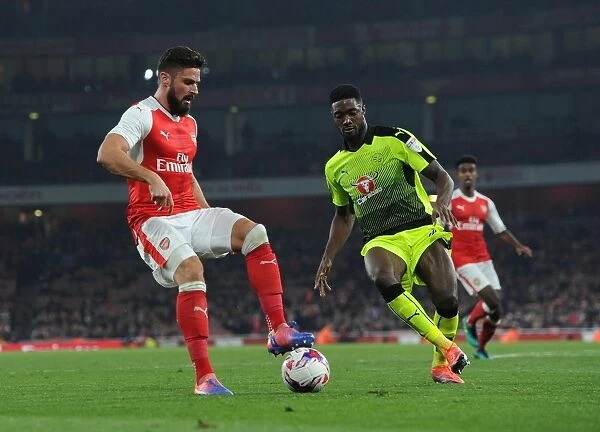 Arsenal's Olivier Giroud Clashes with Reading's Tyler Blackett in EFL Cup Showdown