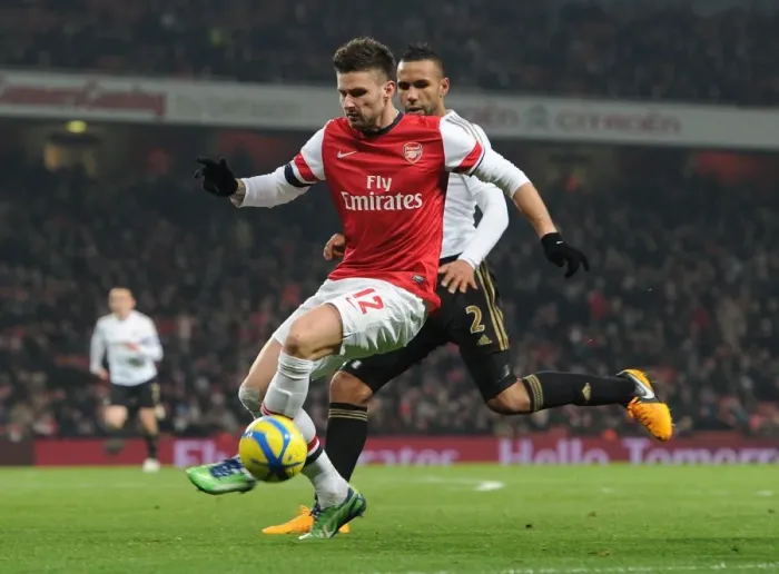 Framed Print : Arsenal's Olivier Giroud Clashes with Swansea's Kyle Bartley in FA Cup Third Round Replay Framed Print : Arsenal's Olivier Giroud Clashes with Swansea's Kyle Bartley in FA Cup Third Round Replay
